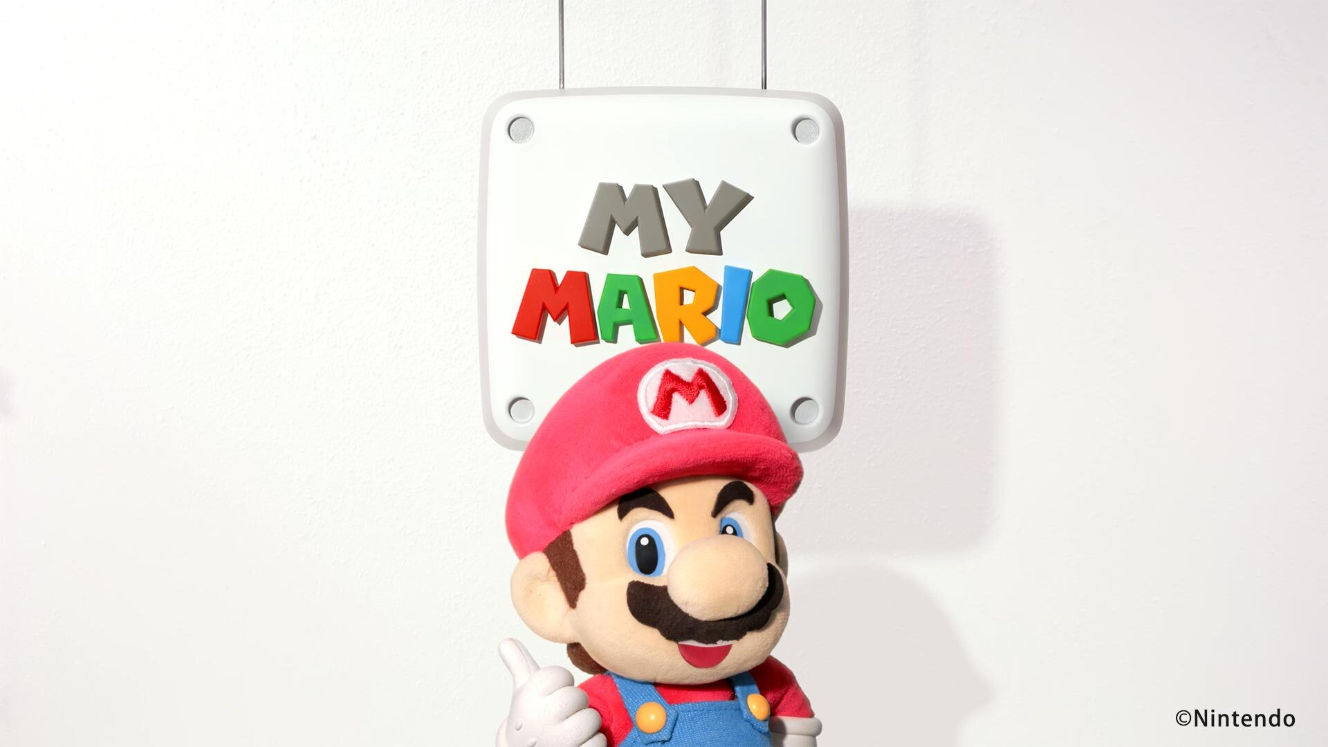 Stop motion Mario in front of the My Mario logo