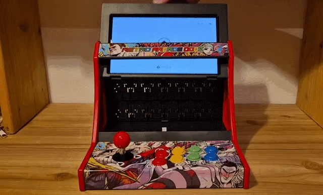 GIF of a Switch 2 console being inserted into the arcade dock/stick