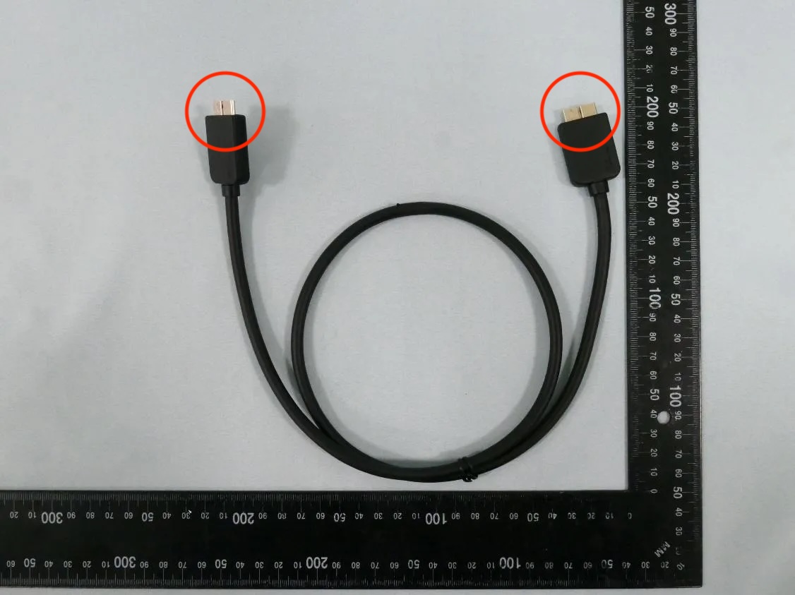 Photo from NCC test report:
BEE-054 custom cable, featuring a proprietary connector on each end
