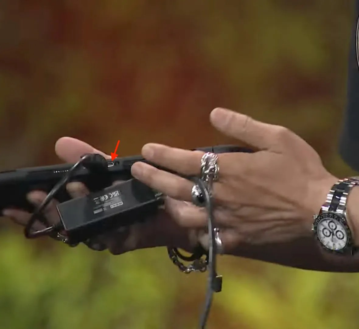 Screenshot of Yoshi-P’s keynote at the FINAL FANTASY XIV Fan Festival 2026 in Anaheim, showing him holding a Switch 2 devkit BEE-056