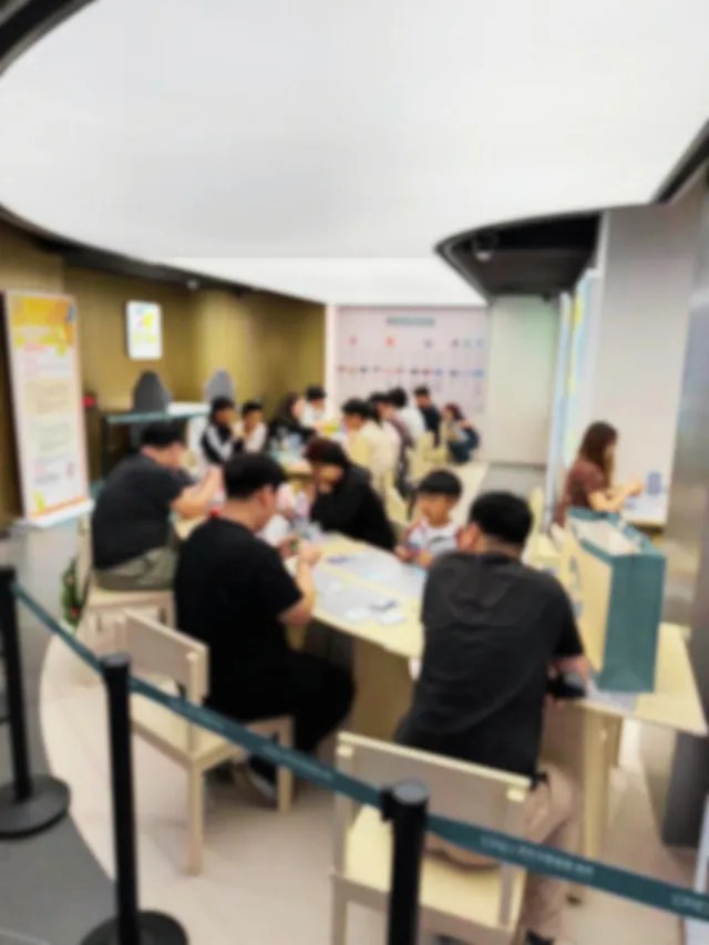 Photo of a card game event inside a Pokémon TCG Official Gym