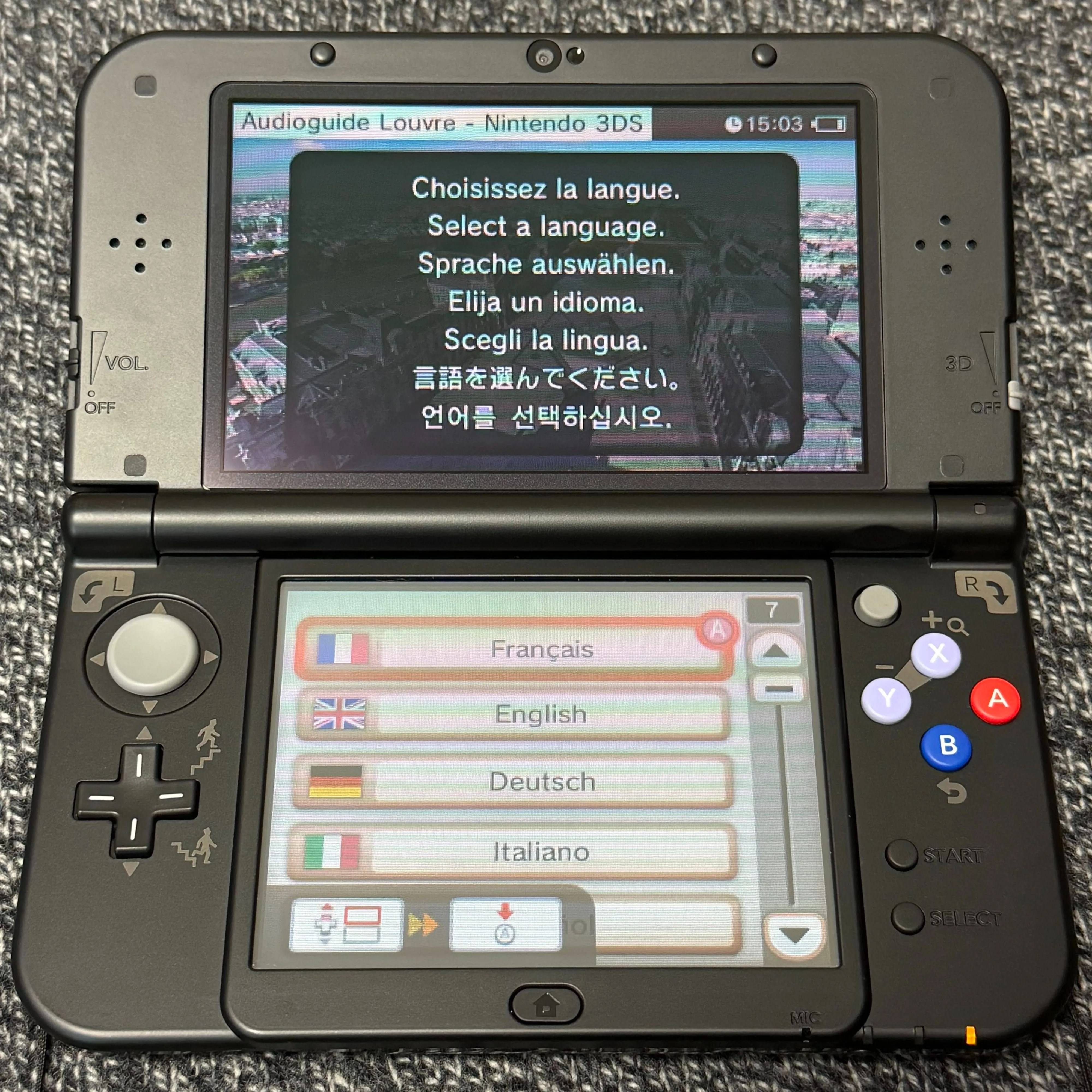 The front side (the side with two screens) of the V3 prototype based on a New 3DS XL.
