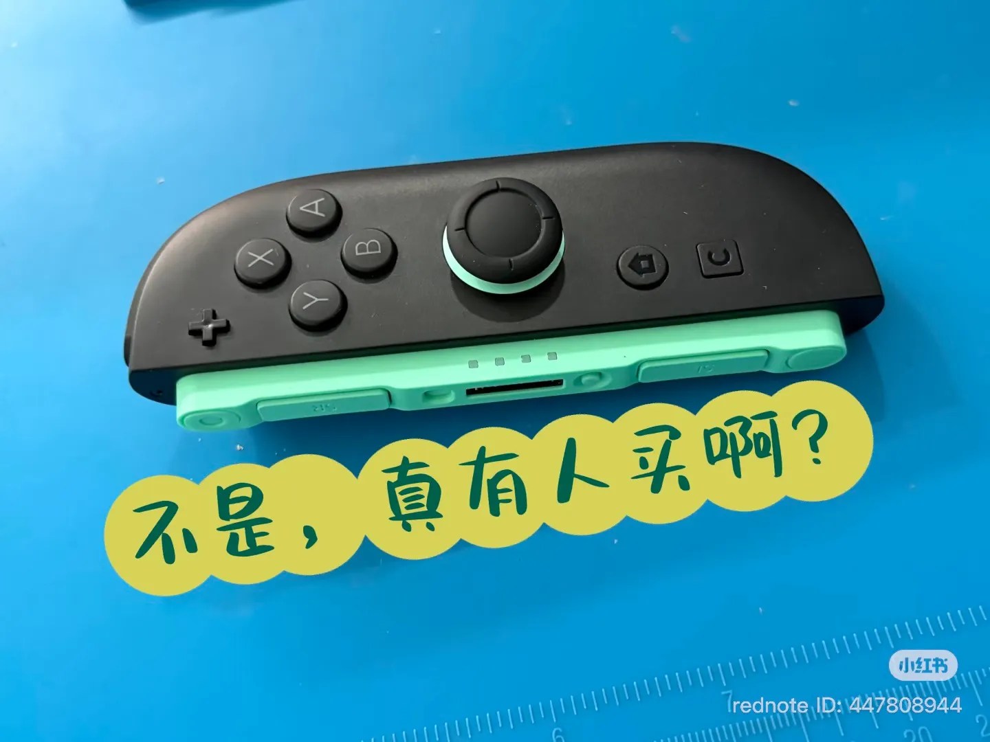 Photo of a counterfeit Joy-Con 2 (right, green), front side exterior