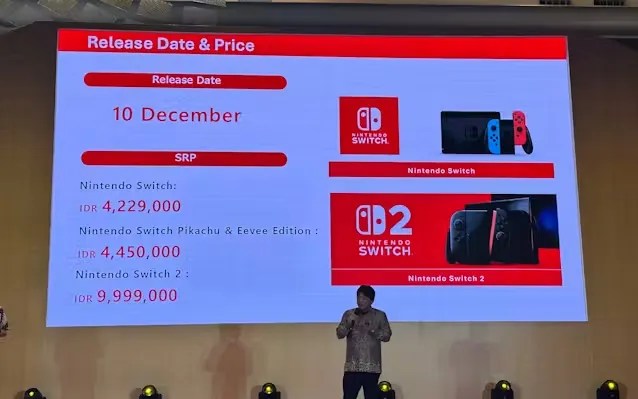 Photo of press conference, showing a slide of Switch systems release date and pricing https://www.nikkei.com/article/DGXZQOGM1495A0U6A910C2000000/