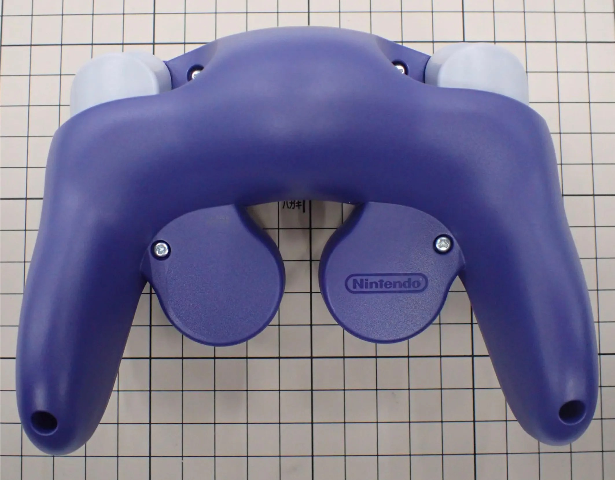 Back side photo to BEE-021, with four visible tri-wing screws
